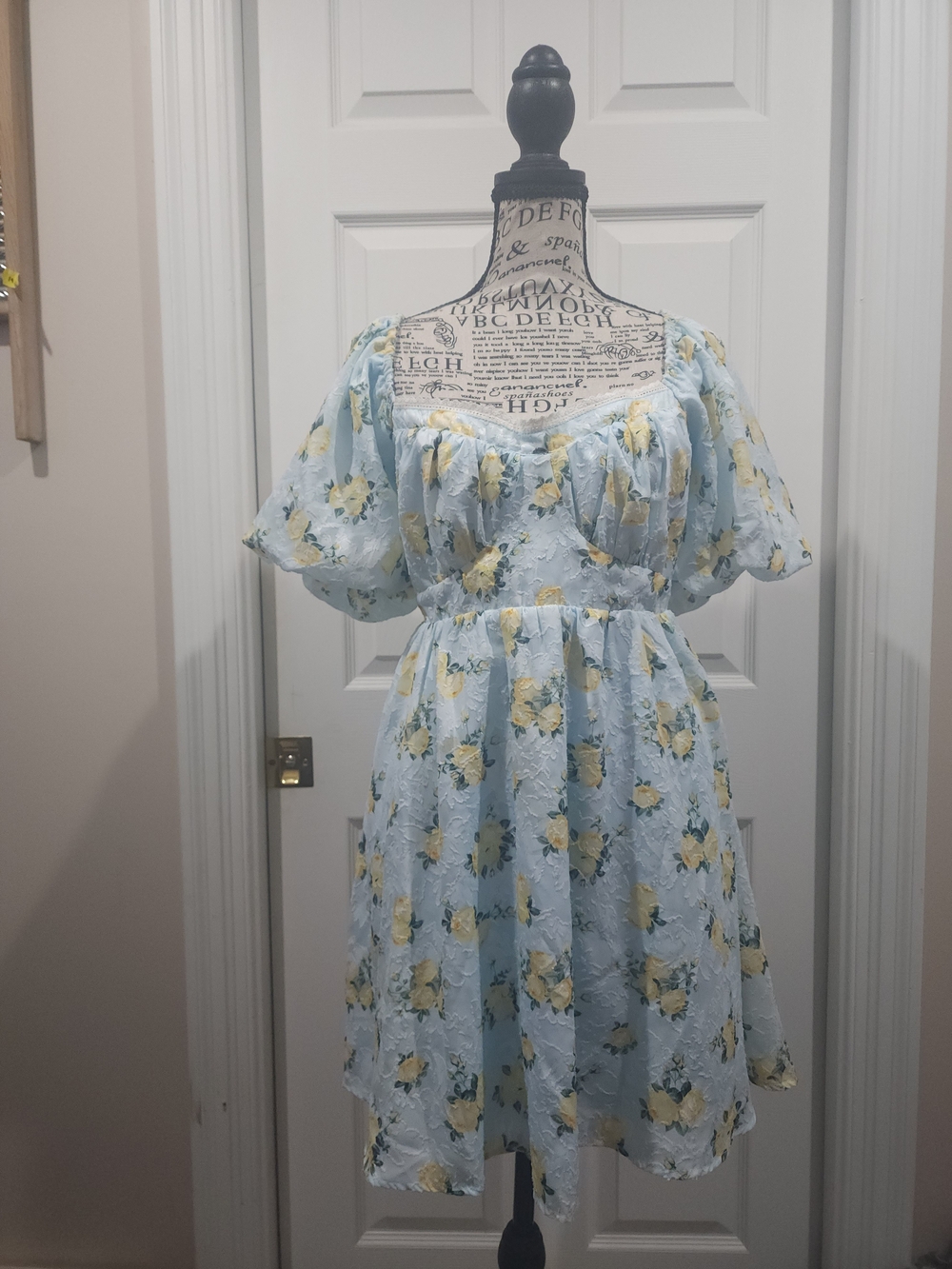 Cottagecore, romantic, feminine floral dress in a soft powder-blue shade